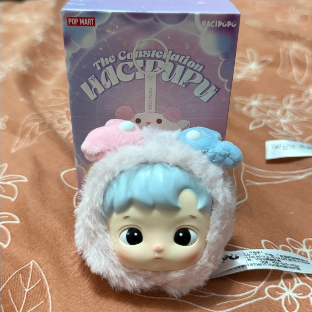 Plush Toy with Blue and Pink Accents